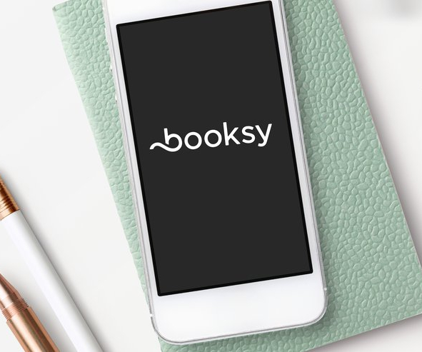 Telefon z aplikacją booksy